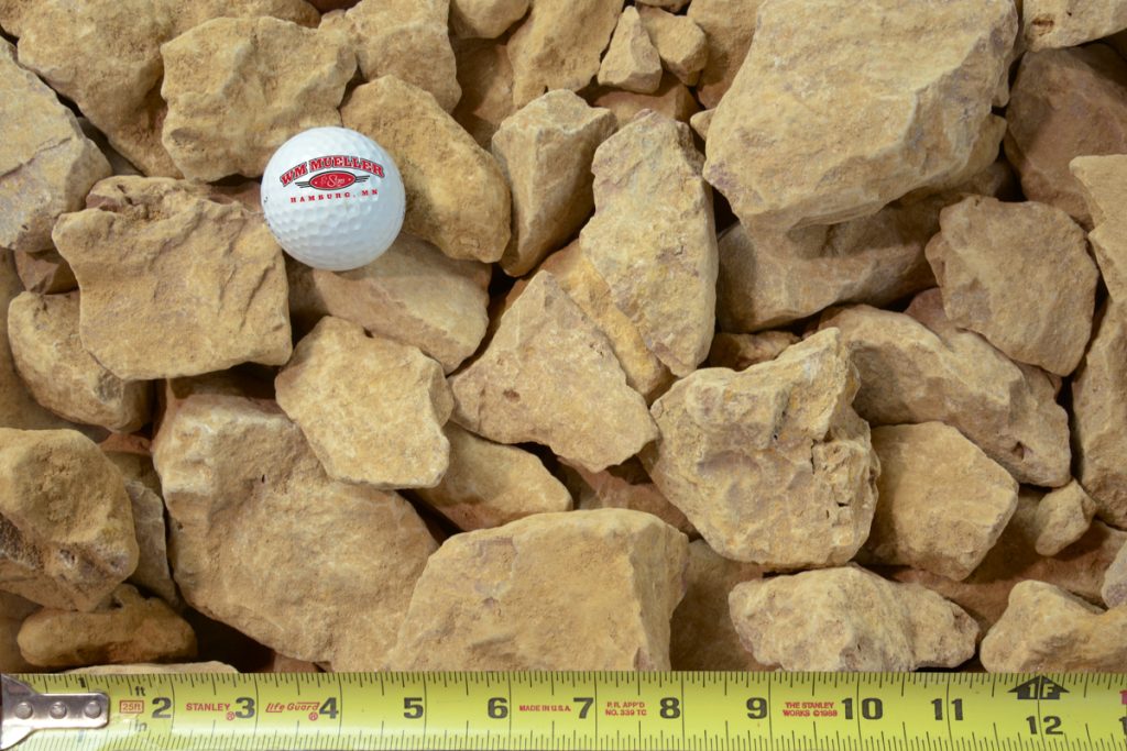 3" limestone clear shown with a measuring tape and golf ball for size comparison